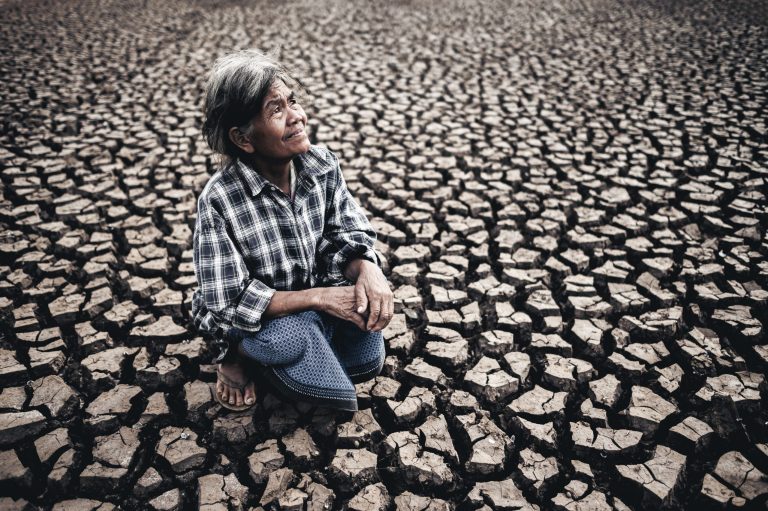 elderly woman dry lake